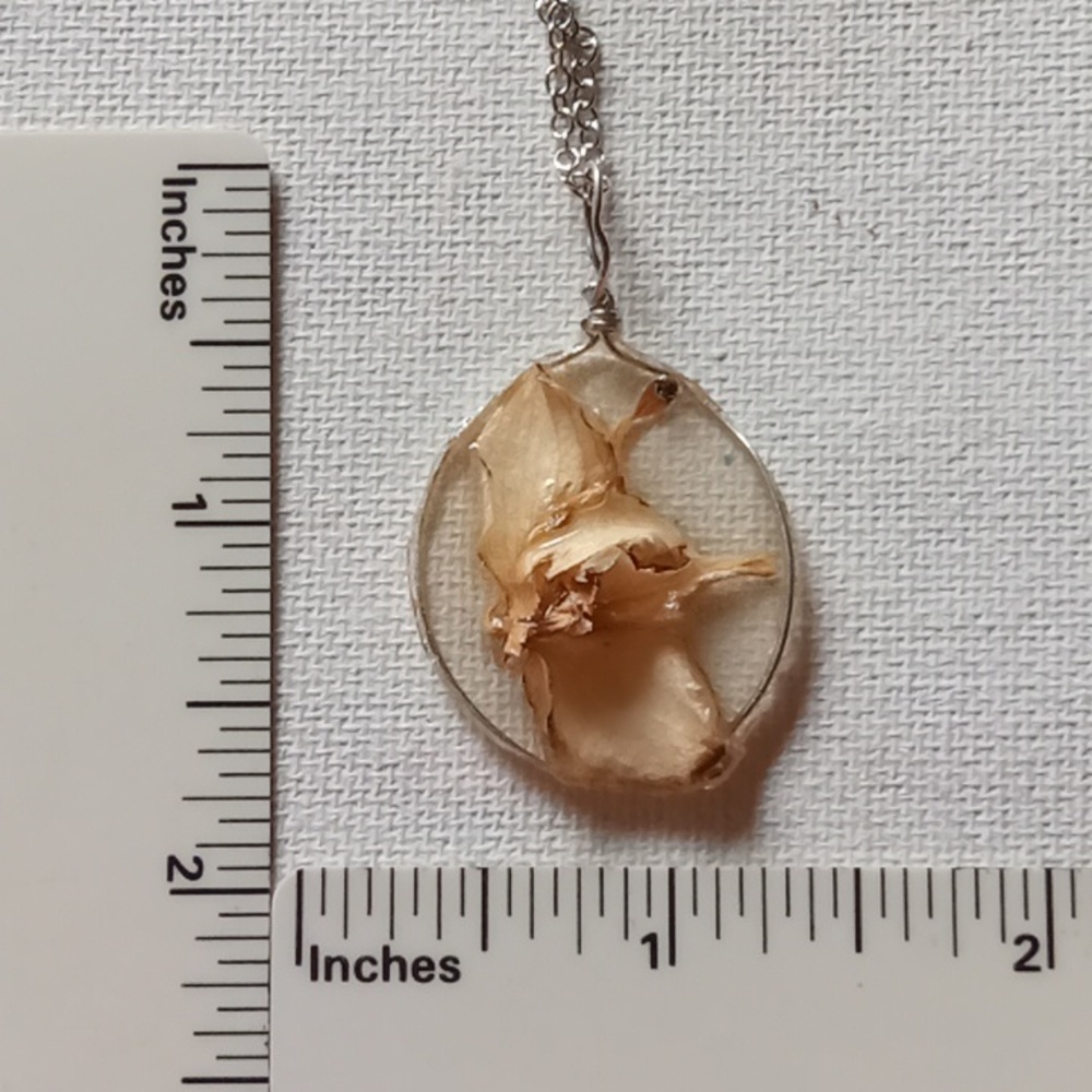 Floral necklace, amulet